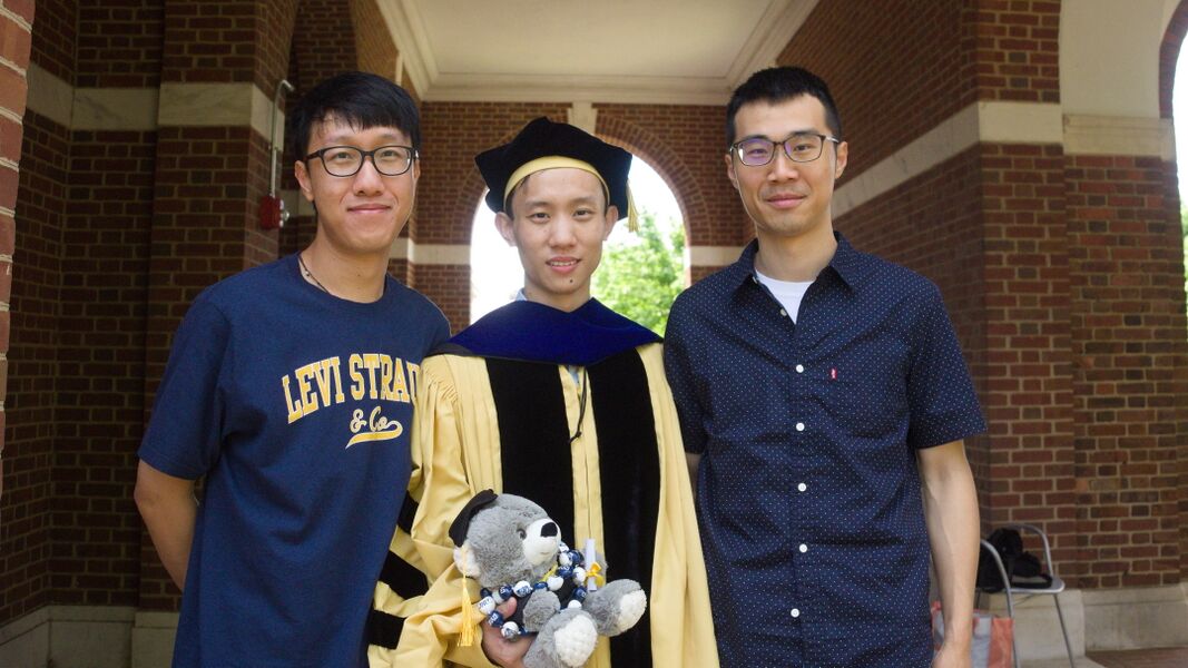 Lab members Lianrui Zuo and Yihao Liu with Dr. Yufan He after his graduation in May 2022.